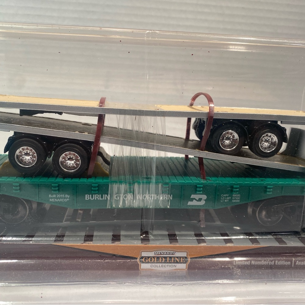 Menards Burlington northern flatcar with 2 flatbed trailers